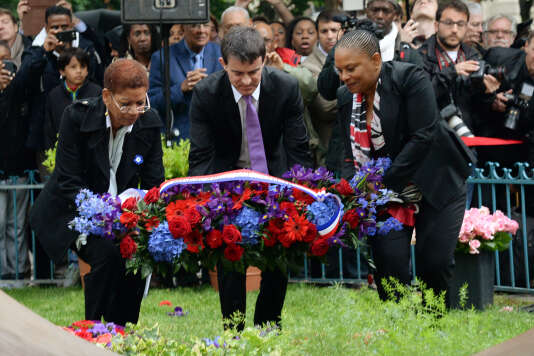 Manuel Valls, George Pau-Langevin et Christiane Taubira lors d’une cérémonie de commémoration de l’abolition de l’esclavage, à Paris le 10 mai 2014.