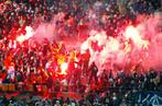 GÉRARD JULIEN / AFP Des supporteurs de l’Olympique de Marseille avec des fumigènes dans une tribune du Stade-Vélodrome.