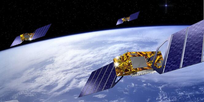 Image de synthèse montrant trois des satellites du futur système de navigation européen Galileo.