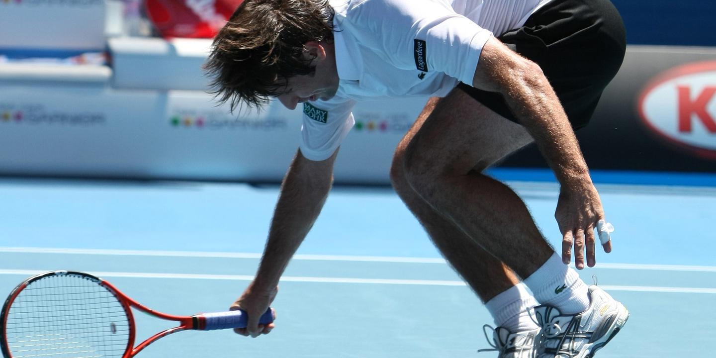Fabrice Santoro chute avec le sourire face à Roger Federer