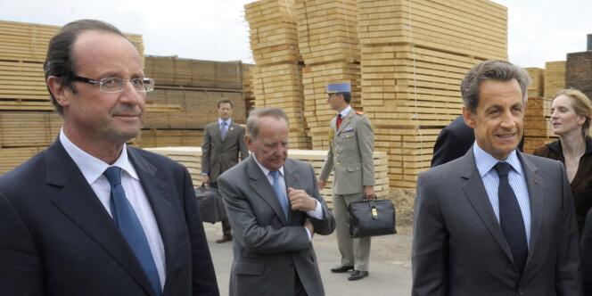 Au premier plan : François Hollande, Nicolas Sarkozy et Bernadette Chirac, lors de la visite de la scierie Piveteau  à Egletons (Creuse), jeudi 28 avril.