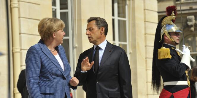 Angela Merkel et Nicolas Sarkozy, mardi 16 août à l'Elysée.  Pour la chancelière allemande, taxer les transactions financières est une 