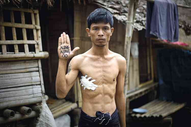 Tun Lin Kyaw, ex-garde du corps d'Aung San Suu Kyi, a été arrêté  en 2004 pour avoir manifesté contre le régime. Libéré après trois années d'emprisonnement,  il vit en exil dans un camp de réfugiés en Thaïlande. Photo :James Mackay/Getty images 