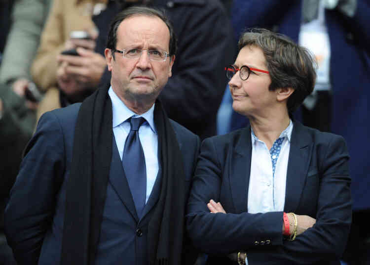 France's opposition Socialist Party (PS) candidate for the 2012 French presidential election François Hollande (L) speaks with Rouen's mayor and Sports' advisor Valérie Fourneyron prior to the rugby union 6 Nations tournament match France versus England, on March 11, 2012 at the Stade de France in Saint-Denis, outside Paris. AFP PHOTO / FRANCK FIFE
