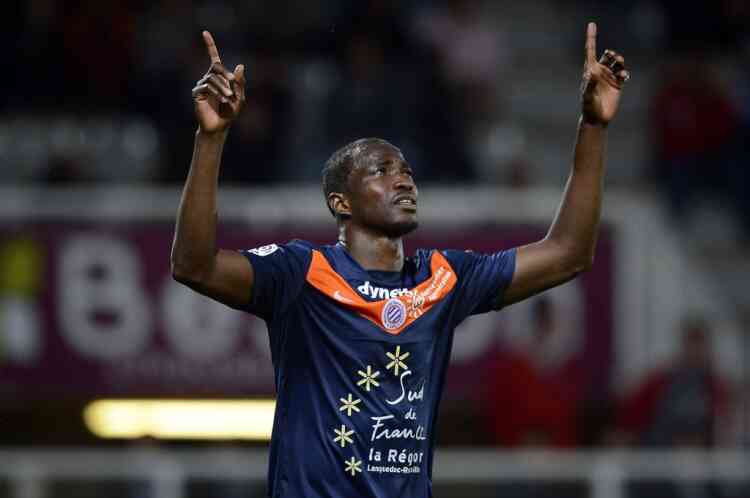 Montpellier's Nigerian forward John Utaka celebrates after scoring a goal during the French L1 football match Auxerre vs Montpellier, on May 20, 2012 at the Abbe-Deschamps stadium in Auxerre. AFP PHOTO / JEFF PACHOUD