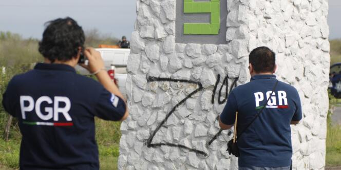 Des graffitis identifient les Zetas comme les auteurs de cette série de crimes.