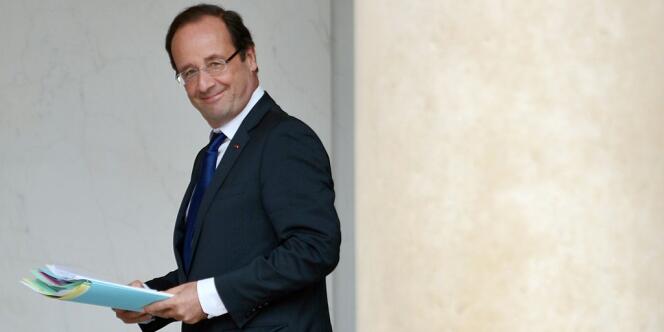 François Hollande à la sortie de l'Elysée, mercredi 11 juillet. 