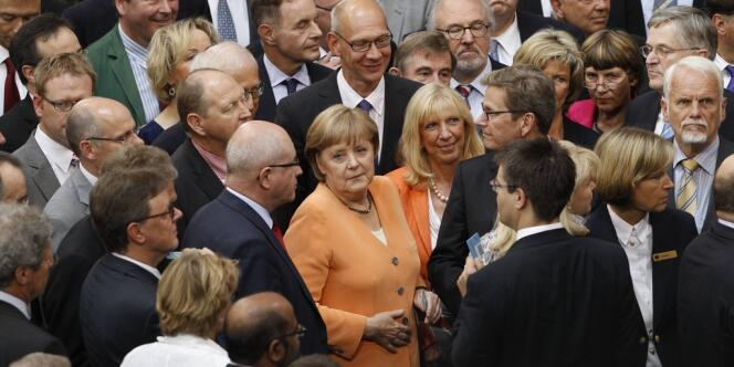 Angela Merkel, au Bundestag, pour le vote approuvant le plan d'aide européen aux banques espagnoles, jeudi 19 juillet 2012. 