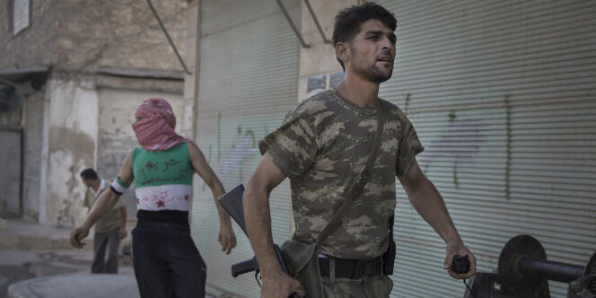 Selon des informations recueillies par Reuters, la Maison Blanche envisagerait de renforcer son aide aux insurgés, sans aller toutefois jusqu'à les armer (ici à Alep, le 22 juillet).