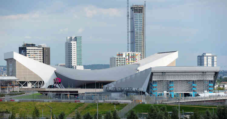 A general view of the London 2012 Olympic Aquatic Centre (C) and the Water Polo Arena (Foreground R) is pictured in east London, on July 21, 2012, ahead of the start of the London 2012 Olympic Games on July 27, 2012. AFP PHOTO / CARL COURT