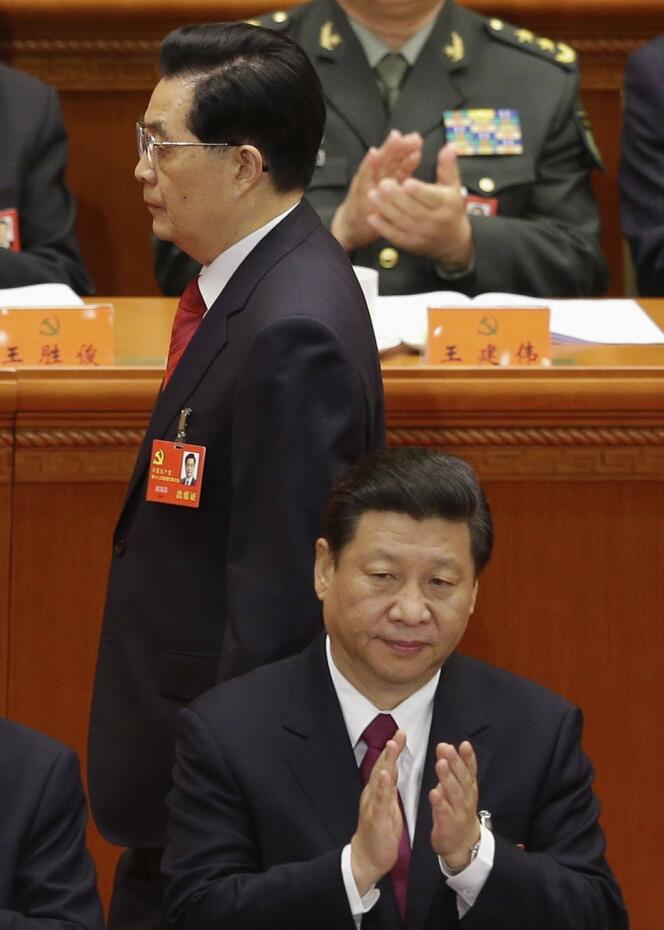 Le président chinois sortant, Hu Jintao (en haut), et son successeur, Ji Xinping.