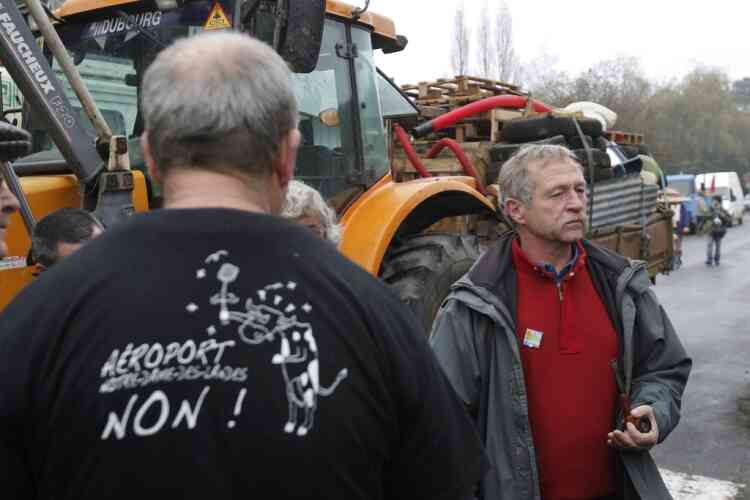 Green Party European Parliament Deputy Jose Bove (R) attends a demonstration against plans to construct a new airport in Notre-Dame-des-Landes, western France, November 17, 2012. The new airport, some 30kms (19 miles) from Nantes, is scheduled to be constructed for 2017.  REUTERS/Stephane Mahe (FRANCE  - Tags: TRANSPORT CIVIL UNREST POLITICS)