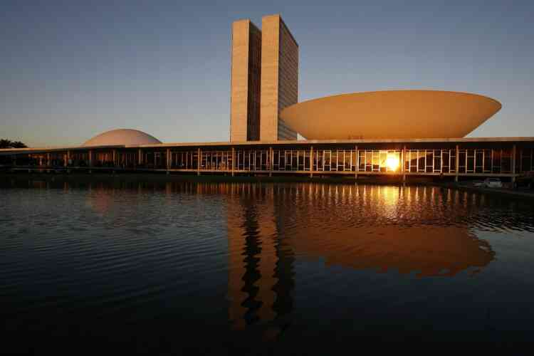 FILE - This Aug 14, 2007 file photo, shows a view of the Brazil's National Congress, designed by Brazilian architect Oscar Niemeyer and inaugurated in 1960, in Brasilia, Brazil. According to a hospital spokeswoman on Wednesday, Dec. 5, 2012, famed Brazilian architect Oscar Niemeyer has died at age 104.  (AP Photo/Eraldo Peres, File)