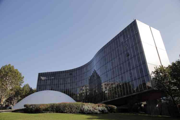 This Oct. 22, 2012 photo shows the headquarters of French Communist Party, designed by Brazilian architect Oscar Niemeyer, in Paris. According to a hospital spokeswoman on Wednesday, Dec. 5, 2012, famed Brazilian architect Oscar Niemeyer has died at age 104. (AP Photo/Christophe Ena)