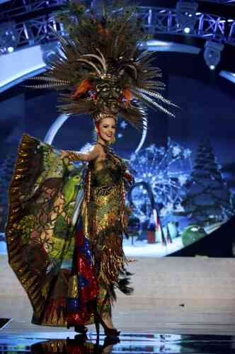 Miss Ecuador Carolina Andrea Aguirre Perez performs onstage at the 2012 Miss Universe National Costume Show at PH Live in Las Vegas, Nevada December 14, 2012. The 89 Miss Universe Contestants will compete for the Diamond Nexus Crown on December 19, 2012. REUTERS/Darren Decker/Miss Universe Organization/Handout (UNITED STATES - Tags: ENTERTAINMENT) FOR EDITORIAL USE ONLY. NOT FOR SALE FOR MARKETING OR ADVERTISING CAMPAIGNS. THIS IMAGE HAS BEEN SUPPLIED BY A THIRD PARTY. IT IS DISTRIBUTED, EXACTLY AS RECEIVED BY REUTERS, AS A SERVICE TO CLIENTS