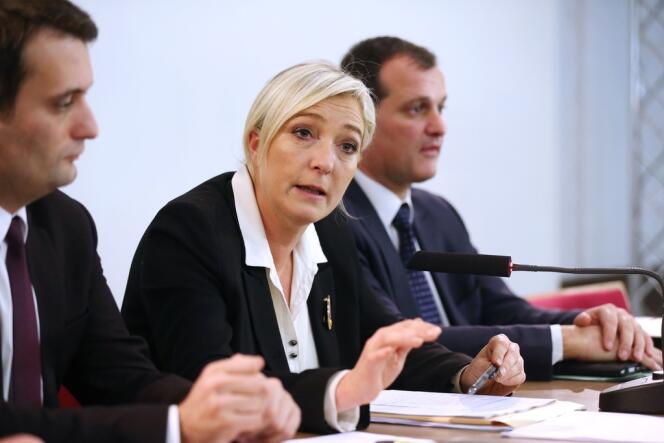 Florian Philippot, Marine Le Pen et Louis Aliot, lors d'une conférence de presse du Front national, le 8 décembre 2012.