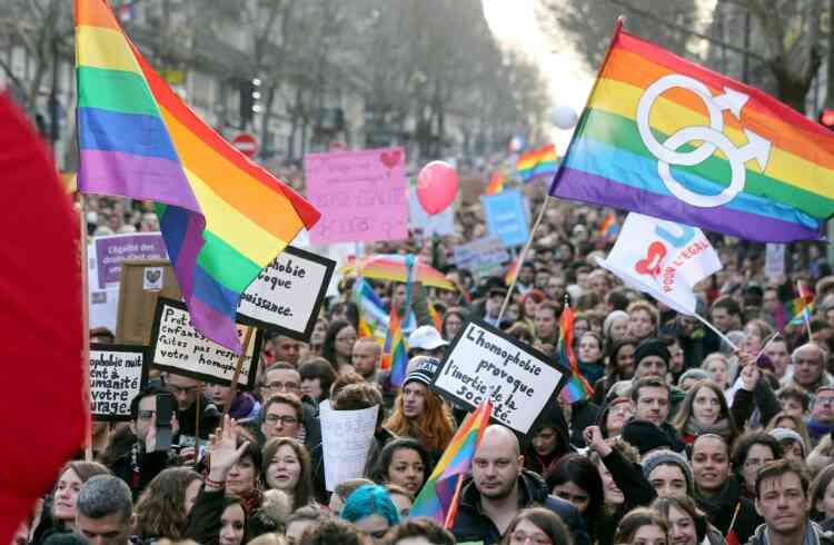 People take part in a demonstration for the legalisation of gay marriage and LGBT (lesbian, gay, bisexual, and transgender) parenting, in Paris on January 27, 2013, two days before a parliamentary debate on the government’s controversial marriage equality bill, which will allow gay couples the same rights as their straight counterparts. AFP PHOTO / THOMAS SAMSON