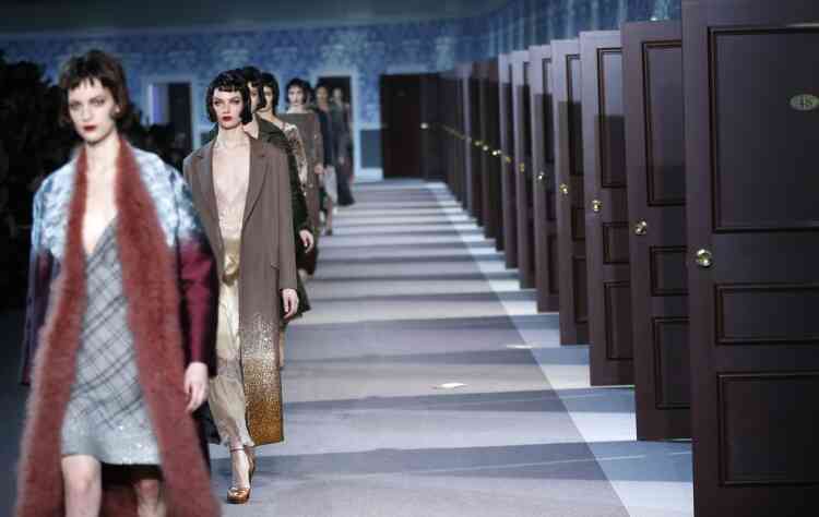 Models present creations by U.S fashion designer Marc Jacobs for Louis Vuitton's Ready to Wear's Fall-Winter 2013-2014 fashion collection, presented, Wednesday, March 6, 2013 in Paris. (AP Photo/Jacques Brinon)
