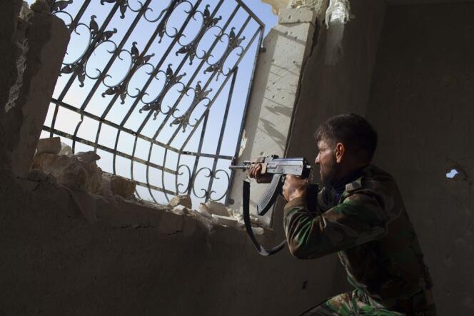 Un rebelle syrien, le 13 mars près d'Alep.