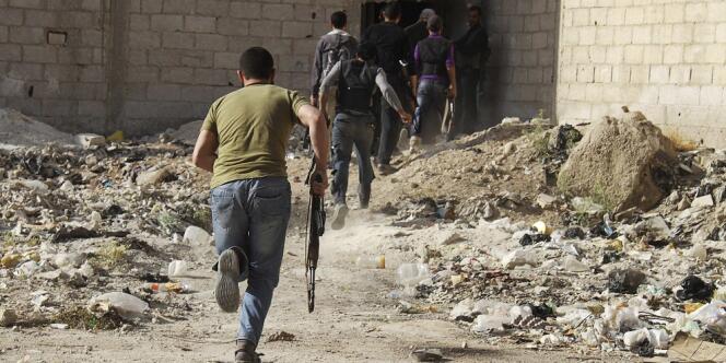 Des rebelles syriens à Damas, le 5 mai.