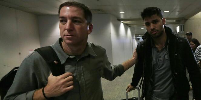 Le journaliste Glenn Greenwald (à gauche) est allé chercher son compagnon David Miranda à l'aéroport de Rio de Janeiro, après que ce dernier a été interrogé pendant neuf heures à l'aéroport d'Heathrow à Londres.