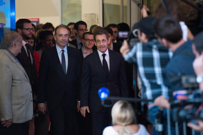 Jean-François Copé et Nicolas Sarkozy au siège de l'UMP, à Paris, le 8 juillet.