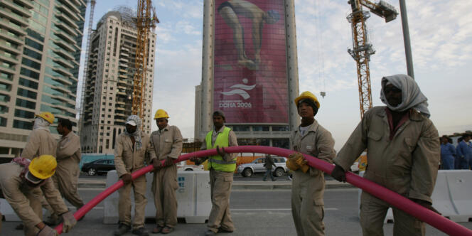 Des ouvriers asiatiques à Doha, au Qatar, en 2006.