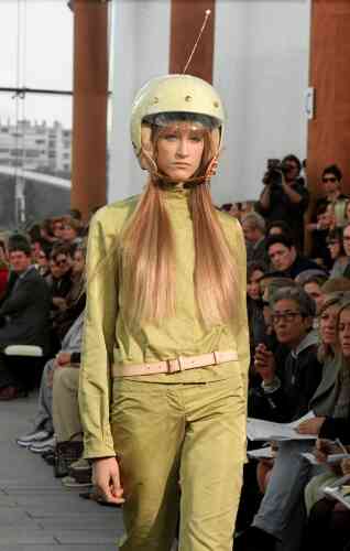 A model presents an avocado pants ensemble matching helmet designed by Marc Jacobs for Louis Vuitton's Spring/Summer ready-to-wear '99 collection in Paris 12 October.