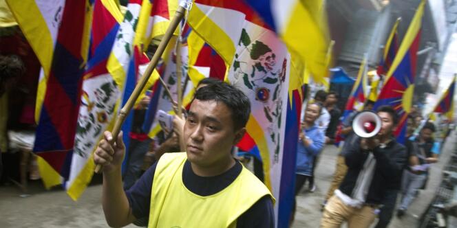 Des Tibétains en exil ont manifesté en Inde le 9 octobre 2013 contre la répression par les forces de sécurité chinoises dans la ville de Biru, dans la région autonome du Tibet.