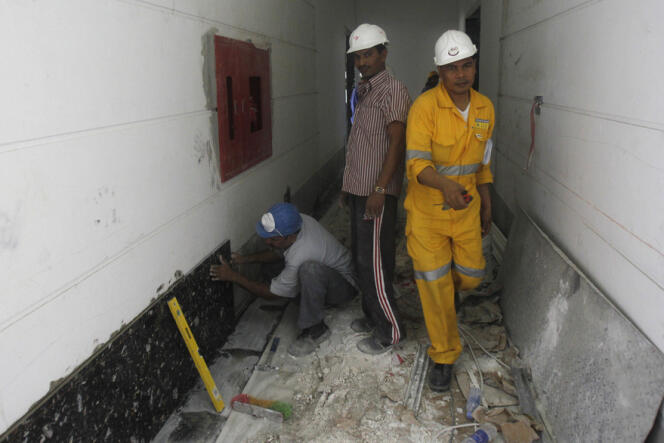 Des travailleurs sur un chantier de Doha, le 18 juin 2012.