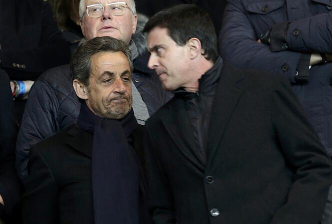 Nicolas Sarkozy et Manuel Valls le 2 mars dans les tribunes du parc des Princes.