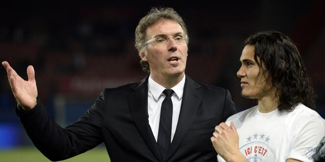 Laurent Blanc en compagnie de l'attaquant parisien Edinson Cavani, le soir du titre du PSG, mercredi 7 mai.
