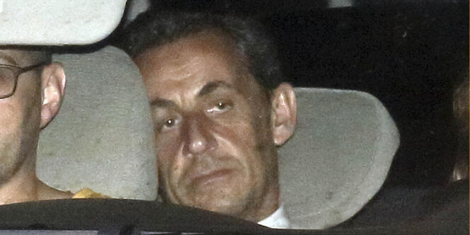 Nicolas Sarkozy, lors de son arrivée au pôle financier où il a été mis en examen par les juges d'instruction, mercredi 2 juillet. 