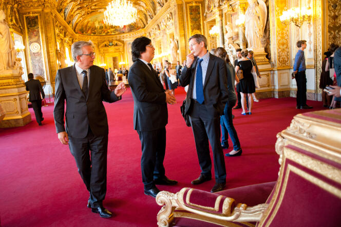 Les sénateurs Pierre Laurent (PCF) et Jean-Vincent Placé (EELV) au Palais du Luxembourg à Paris, en septembre 2013. 