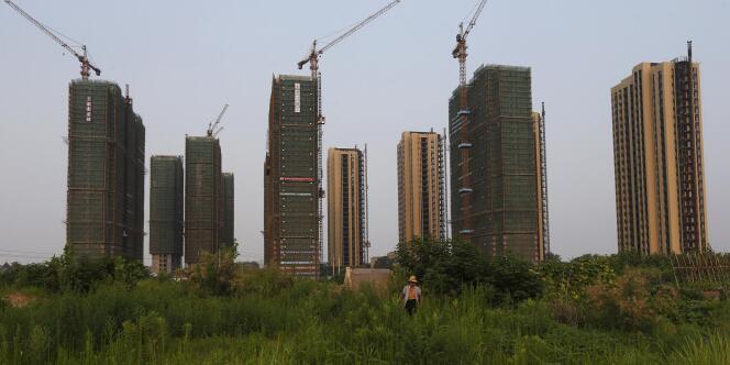 Construction de bâtiments résidentiels à Hangzhou, dans l'est de la Chine, le 21 juillet.