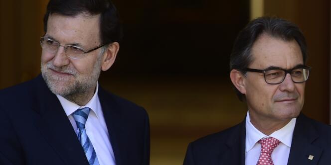 Le chef du gouvernement espagnol Mariano Rjoy et le président de la région de Catalogne, Artur Mas, à la sortie de leur entrevue, mercredi 30 juillet 2014, à la Moncloa, à Madrid.