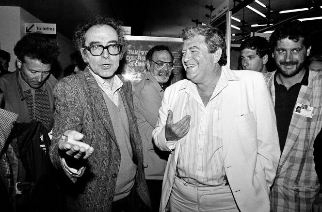 Le producteur Menahem Golan (à droite) et le réalisateur Jean-Luc Godard en 1987 à Cannes, lors de la présentation de 