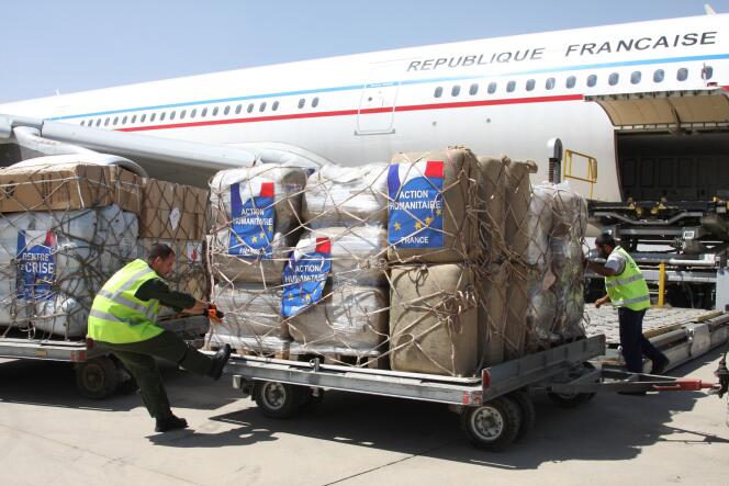 Déchargement de l’aide humanitaire à l’aéroport d’Erbil (Irak), le 10 août.