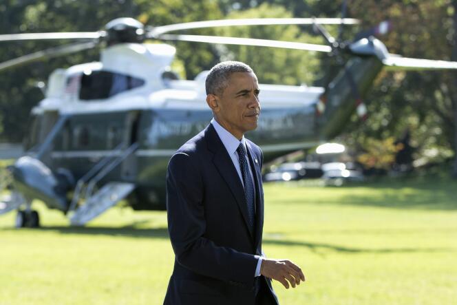 Barack Obama, dans les jardins de la Maison Blanche, le 23 septembre 2014, après l'annonce de la participation de cinq pays arabes à la coalition internationale en lutte contre les djihadistes de l'Etat islamique.