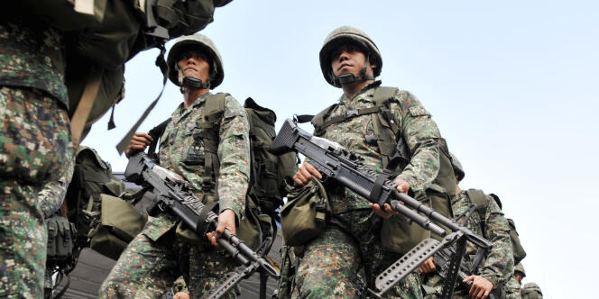 Un contingent de la marine philippine en partance vers la Sud du pays pour combattre les rebelles du groupe islamiste Abou Sayyaf en 2009.