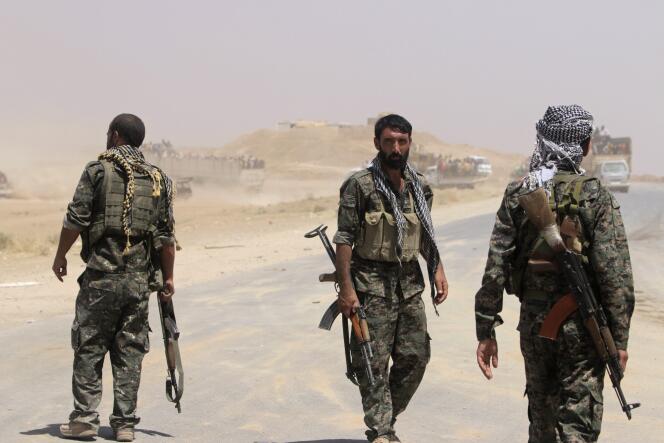 Des combattants kurdes du parti PYD, en Syrie. 