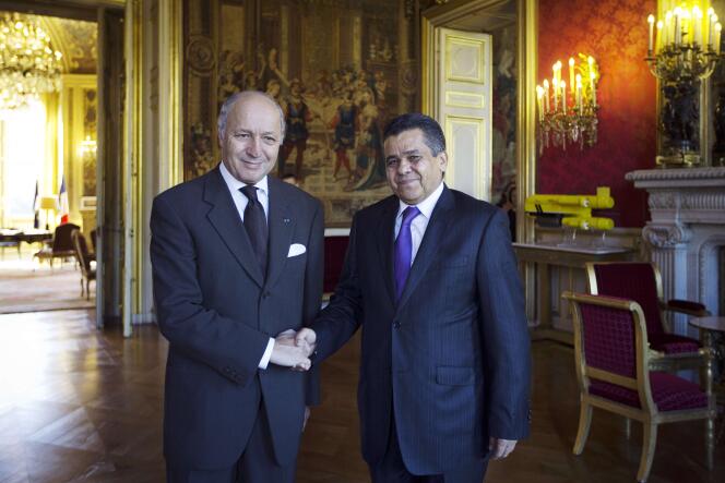 Laurent Fabius et son homologue libyen Mohamed Dayri, le 14 octobre 2014 à Paris.