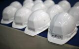The Alstom logo is pictured on working helmets during an inaugural visit of their offshore wind turbine plants in Montoir-de-Bretagne, near Saint-Nazaire, western France, December 2, 2014. REUTERS/Stephane Mahe (FRANCE - Tags: POLITICS ENERGY ENVIRONMENT BUSINESS)