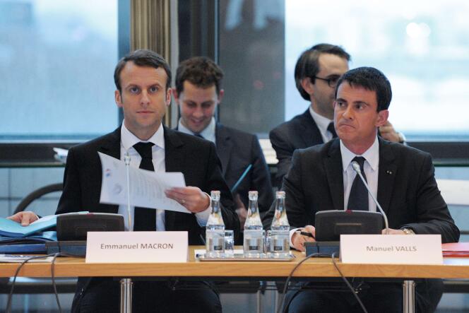 Le Premier ministre Manuel Valls et le ministre de l'Economie Emmanuel Macron assistent à une réunion du Conseil National de l'Industrie (CNI) au ministère de l'Economie, le 10 Décembre 2014 à Paris.