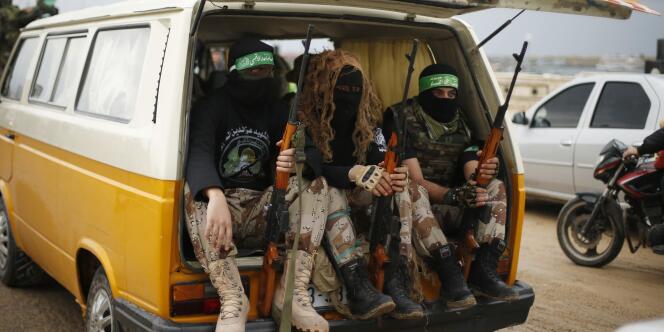 Des membres des brigades Al-Qassam, branche armée du Hamas, en marge d'une parade militaire à Gaza le 14 décembre.