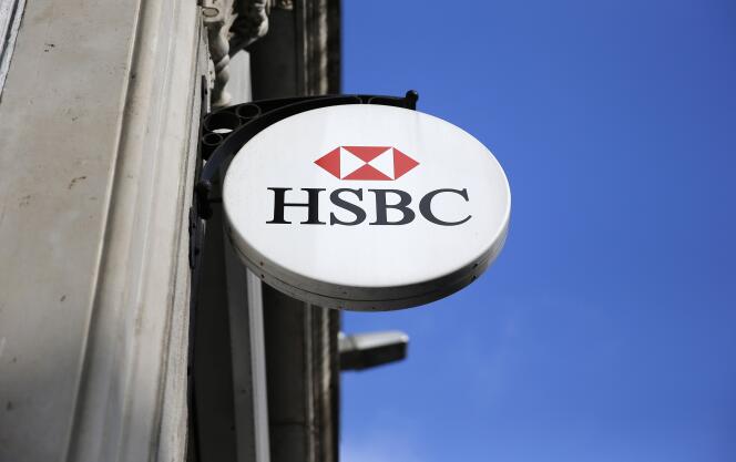 An HSBC sign is seen outside a bank branch in London February 9, 2015. British bank HSBC Holdings Plc admitted on February 8, 2015 failures by its Swiss subsidiary, in response to media reports it helped wealthy customers dodge taxes and conceal millions of dollars of assets.