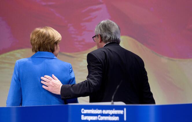 La chancelière Angela Merkel et le président de la Commission européenne, Jean-Claude Juncker, le 4 mars à Bruxelles.