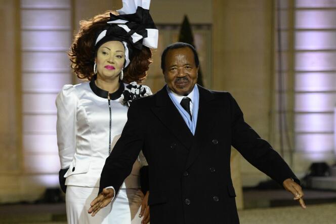Le président camerounais Paul Biya et son épouse, le 6 décembre 2013 à Paris.