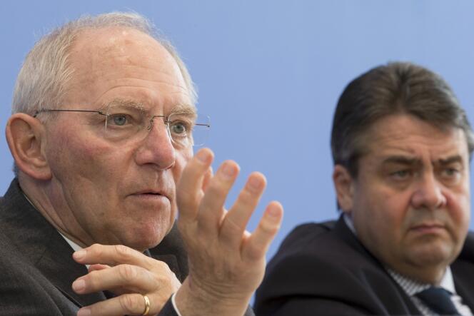 Le ministre allemand des finances, Wolfgang Schäuble, et son collègue de l'économie, Sigmar Gabriel, à Berlin, mercredi 18 mars.