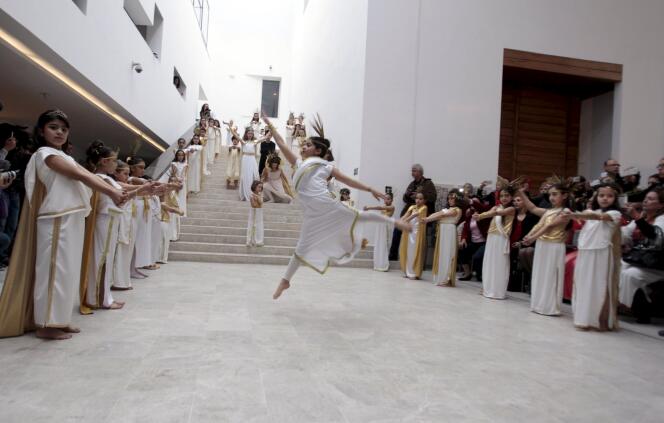 Children dance during the reopening ceremony of the Bardo Museum in Tunis, March 24, 2015.